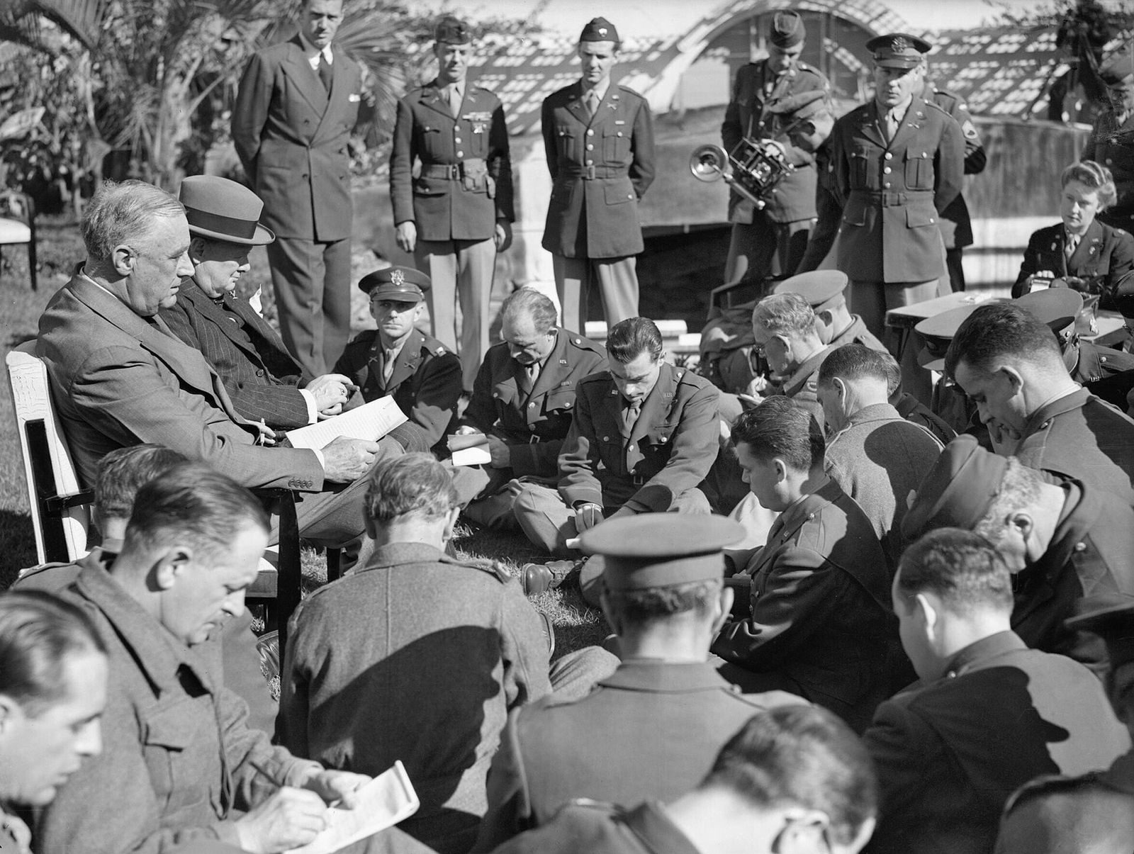 President Franklin D. Roosevelt and Prime Minister Winston Churchill seated together at the Allied conference in Casablanca, January 1943