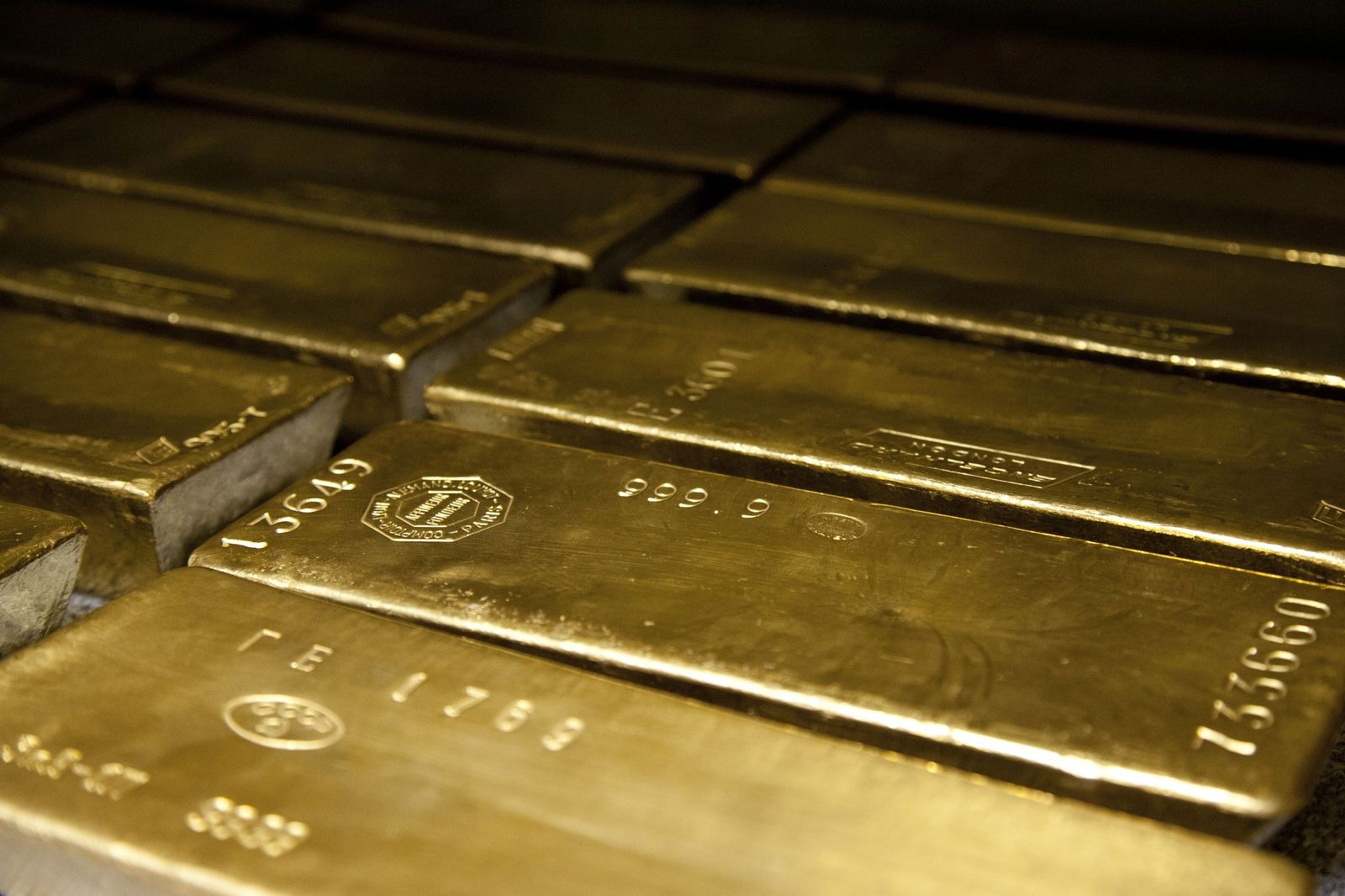 US dollar bills beside gold bars — the parallel settlement rails
