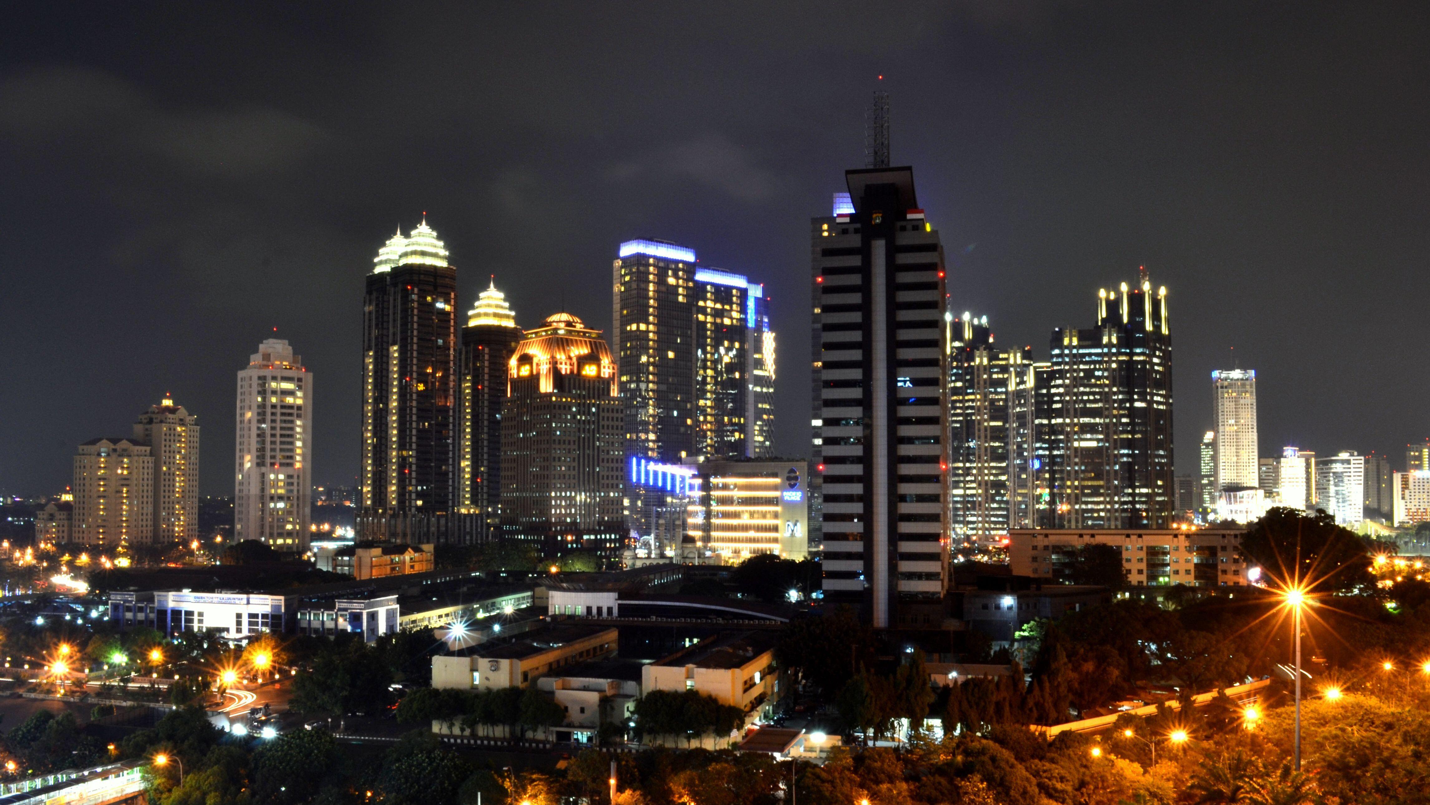 Jakarta’s Sudirman Central Business District financial skyline at night — the capital’s financial heart, home to the Indonesia Stock Exchange