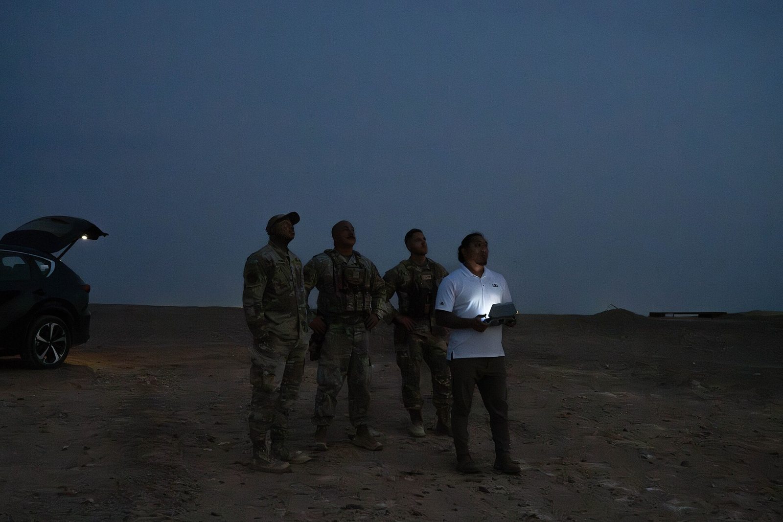 A military quadcopter drone being launched; Israeli drone strikes in Gaza have intensified despite the year-old ceasefire agreement